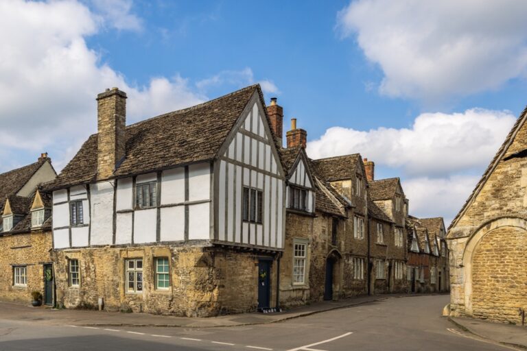 Historic English town featuring several traditional buildings.